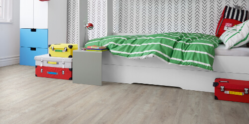 Cream flooring in Childs bedroom